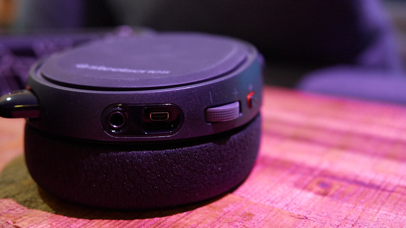 Volume control and a mute button are both on the headset itself. The mute button sticks up when engaged.